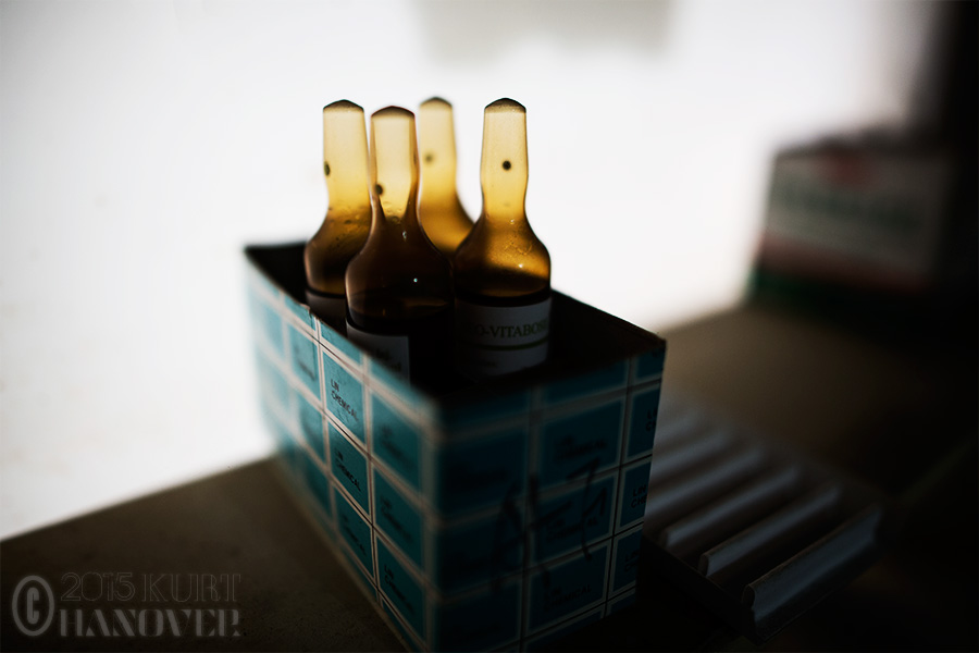 Old vials of medicine in an abandoned hospital.